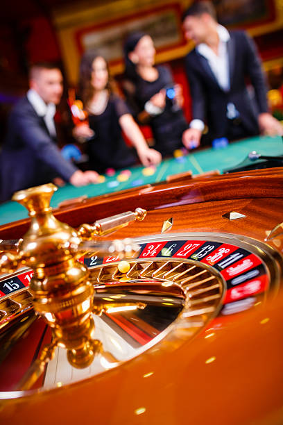 tango77 Live Sic Bo studio showing live dealer, three dice cage, and real-time outcome display on screen